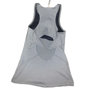 Free people movement top with circle cutout cross back